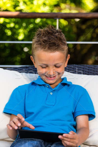 Young boy with tablet Stock photo © bigandt