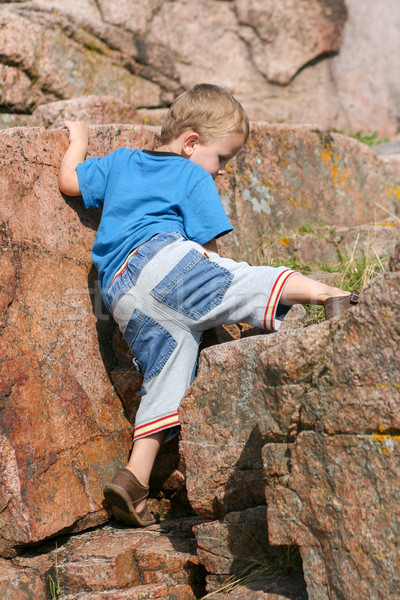Boy Toddler Climbing a Rock Stock photo © bigandt