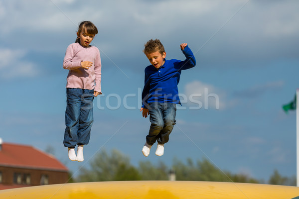 Jumping kids Stock photo © bigandt