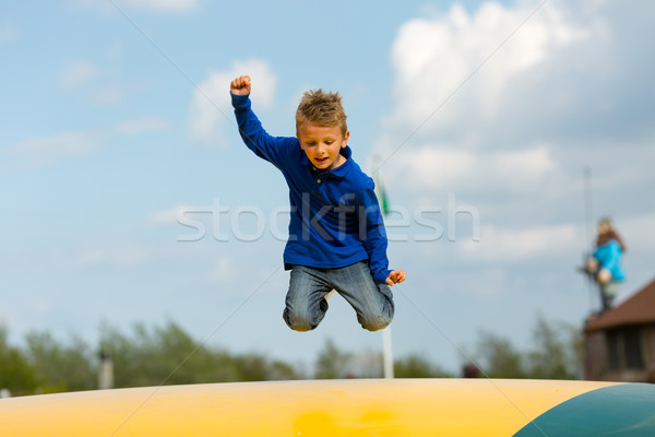 Jumping boy Stock photo © bigandt