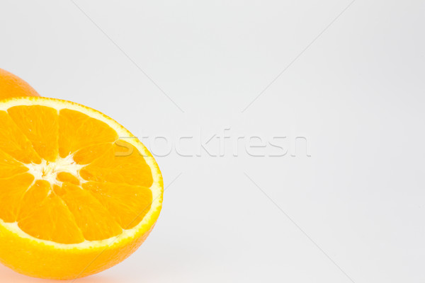 Gesneden oranje witte ruimte half exemplaar ruimte Stockfoto © bigandt