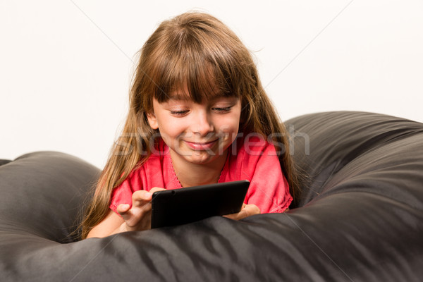 Girl with tablet Stock photo © bigandt