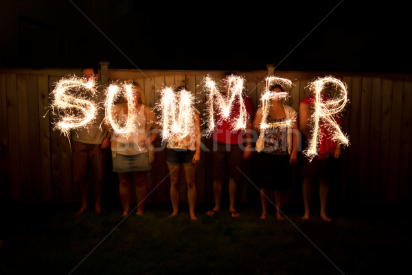 Stock photo: The word Summer in sparklers time lapse photography