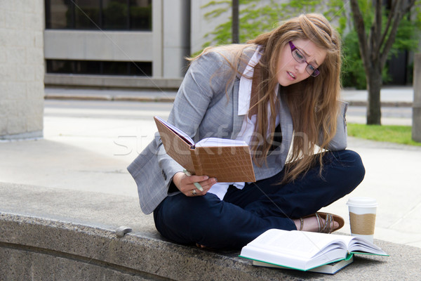 Stressed student studying on campus Stock photo © bigjohn36