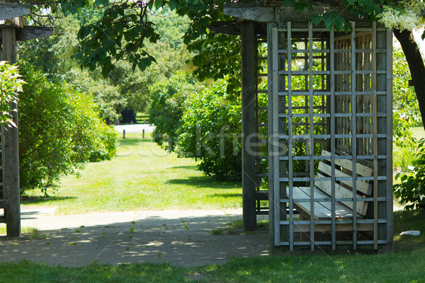 Gazebo with bench in a garden Stock photo © bigjohn36