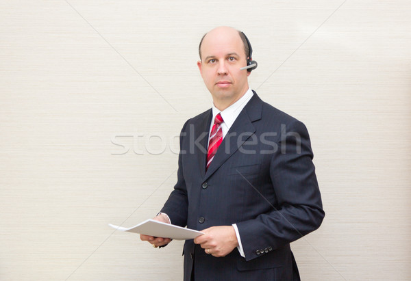 Business man with headset and document Stock photo © bigjohn36