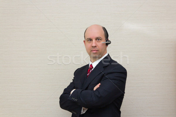 Stock photo: Business man with a headset