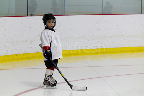 Little boy playing ice hockey Stock photo © bigjohn36