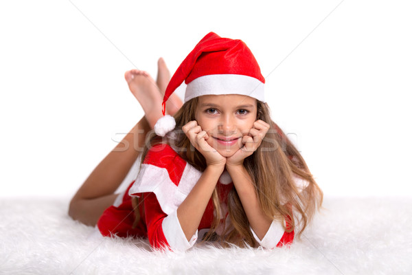 Cute smiling girl with Santa hat and suit Stock photo © BigKnell