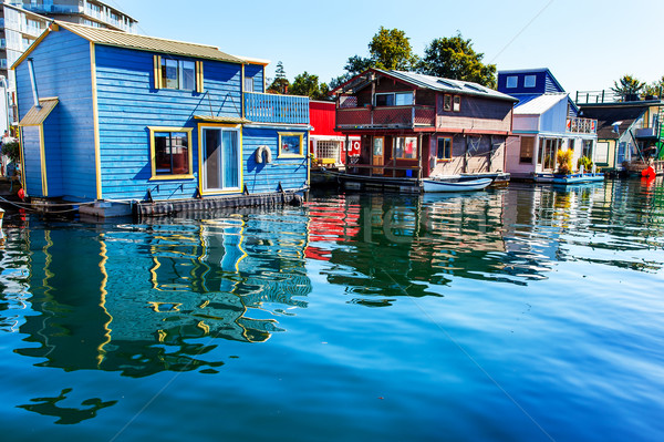 Floating Home Village Blue Red  Brown Houseboats Fisherman's Wha Stock photo © billperry