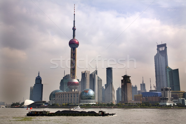 Shanghai Pudong Skyline TV Tower Daytime with Boat Stock photo © billperry