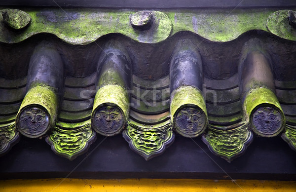 Roof Tile Faces Green Moss Baoguang Si Shining Treasure Buddhist Stock photo © billperry