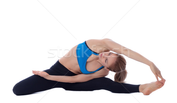 Stretching of ischio, obliques, adductors and quadriceps Stock photo © blanaru