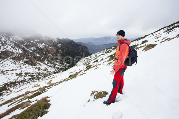 Man on top of the mountains Stock photo © blanaru