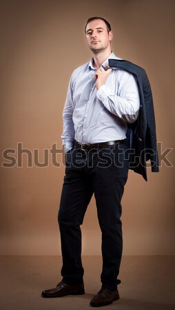 Сток-фото: молодые · бизнесмен · костюм · положение