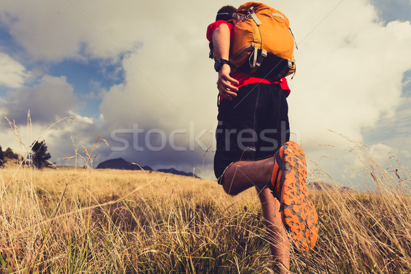 Hiker walking with backpack Stock photo © blasbike