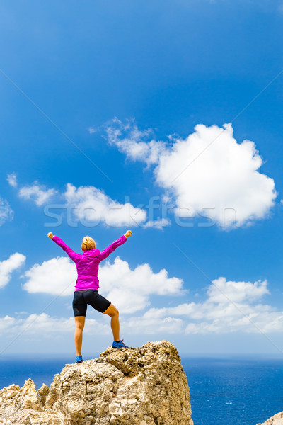 Happy trail runner winner reaching life goal success woman Stock photo © blasbike