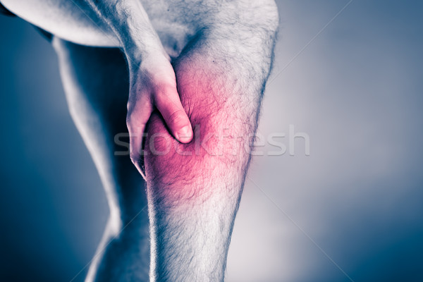 Leziuni fizice picior durere masculin dureri musculare funcţionare Imagine de stoc © blasbike