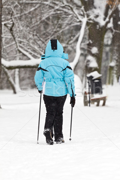 Nordic walking on snow Stock photo © blasbike