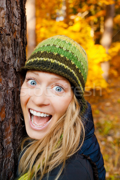Boldog lány erdő ölel fa fatörzs erdő Stock fotó © blasbike
