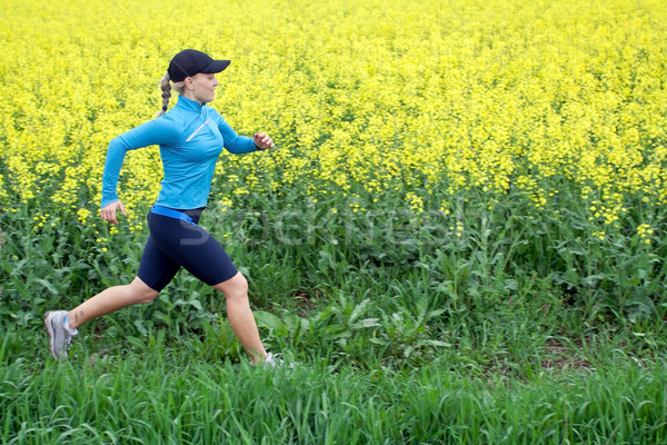 Stock photo: Woman running outdoors on spring