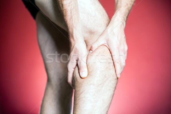 Joelho dor em massagem homem Foto stock © blasbike