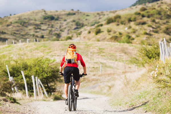 Man enduro mountain biking on country road Stock photo © blasbike
