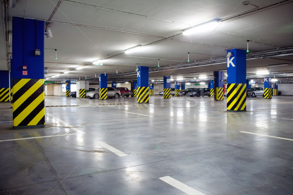 Parking garage of shopping center, underground interior Stock photo © blasbike