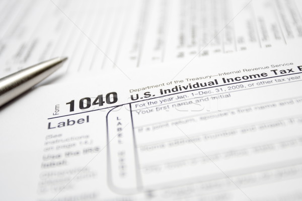 Stock photo: 1040 Tax Return Form and pen
