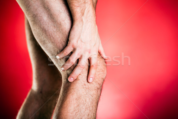 Funcţionare leziuni fizice genunchi durere picior alergător Imagine de stoc © blasbike