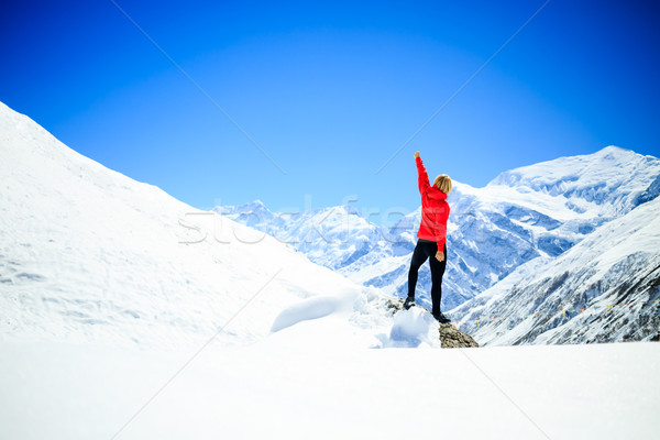 Woman success climbing on mountain peak Stock photo © blasbike