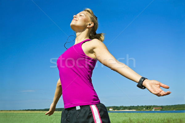 Woman relaxing after running Stock photo © blasbike