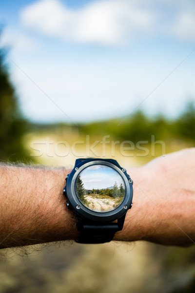 Taking photo with smartwatch camera, wearable technology Stock photo © blasbike
