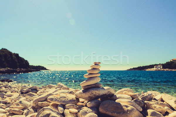 Steine Gleichgewicht Kieselsteine blau Meer Stock foto © blasbike