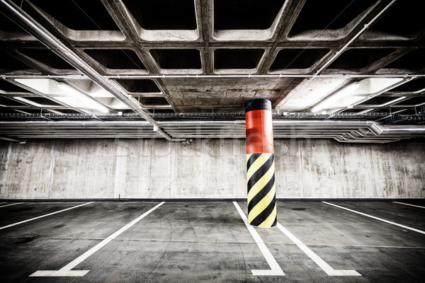 Concrete wall underground parking garage interior Stock photo © blasbike