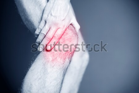 Genunchi durere leziuni fizice dureros picior masculin Imagine de stoc © blasbike