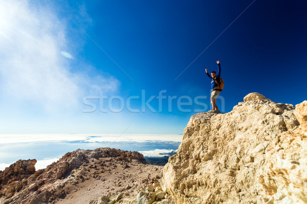 Stock photo: Hiking man or trail runner looking at view in mountains