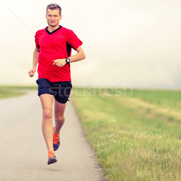 Man running and training healthy lifestyle Stock photo © blasbike