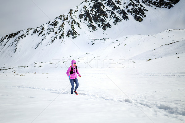 Winter running woman. Trail runner inspiration, sport and fitnes Stock photo © blasbike