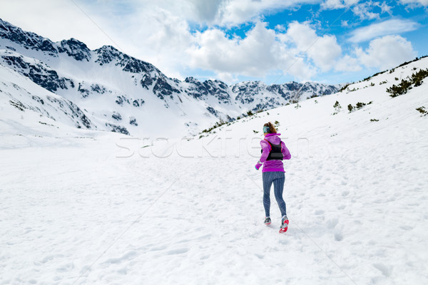 Stock photo: Winter running woman. Trail runner inspiration, sport and fitnes