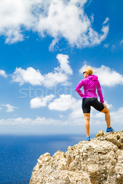 Happy trail runner looking at inspirational landscape Stock photo © blasbike