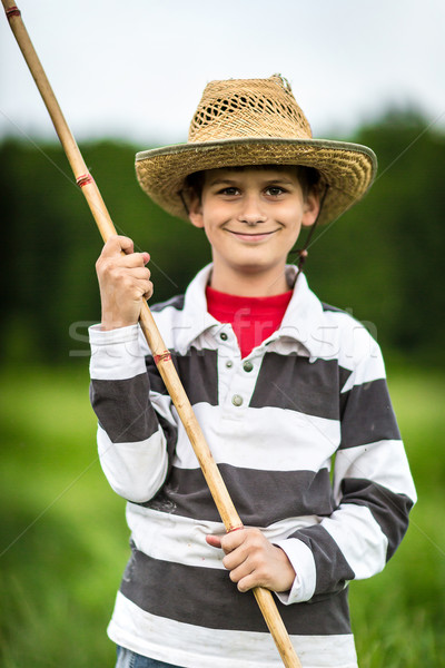 Young boy fishing in a river Stock photo © bloodua