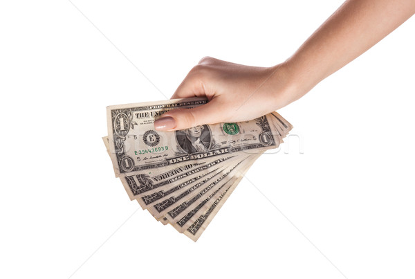 Female hand holding money dollars isolated on white background Stock photo © bloodua