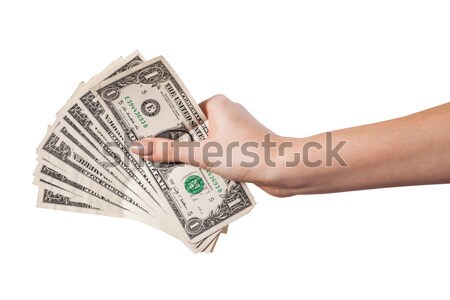 Female hand holding money dollars isolated on white background Stock photo © bloodua