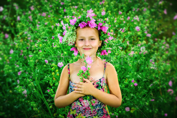 Stock photo: Portrait of a little girl in wreath of flowers