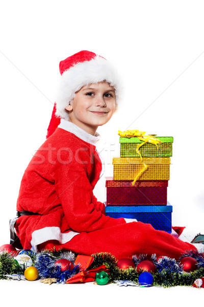 Boy holding a christmas gift Stock photo © bloodua