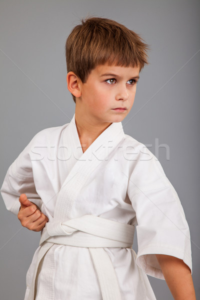 Karate Junge weiß Kimono kämpfen isoliert Stock foto © bloodua