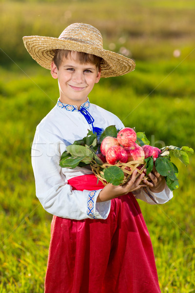 Happy farmer boy hold Organic Apples in Autumn Garden Stock photo © bloodua