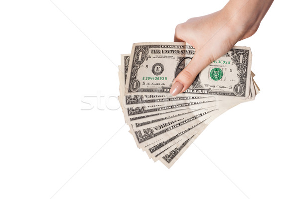 Female hand holding money dollars isolated on white background Stock photo © bloodua