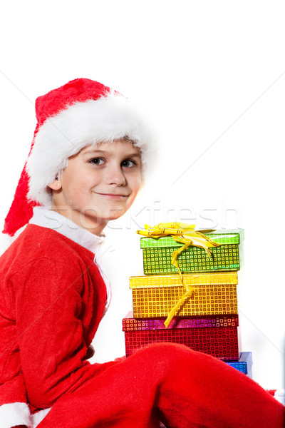 Boy holding a christmas gift Stock photo © bloodua